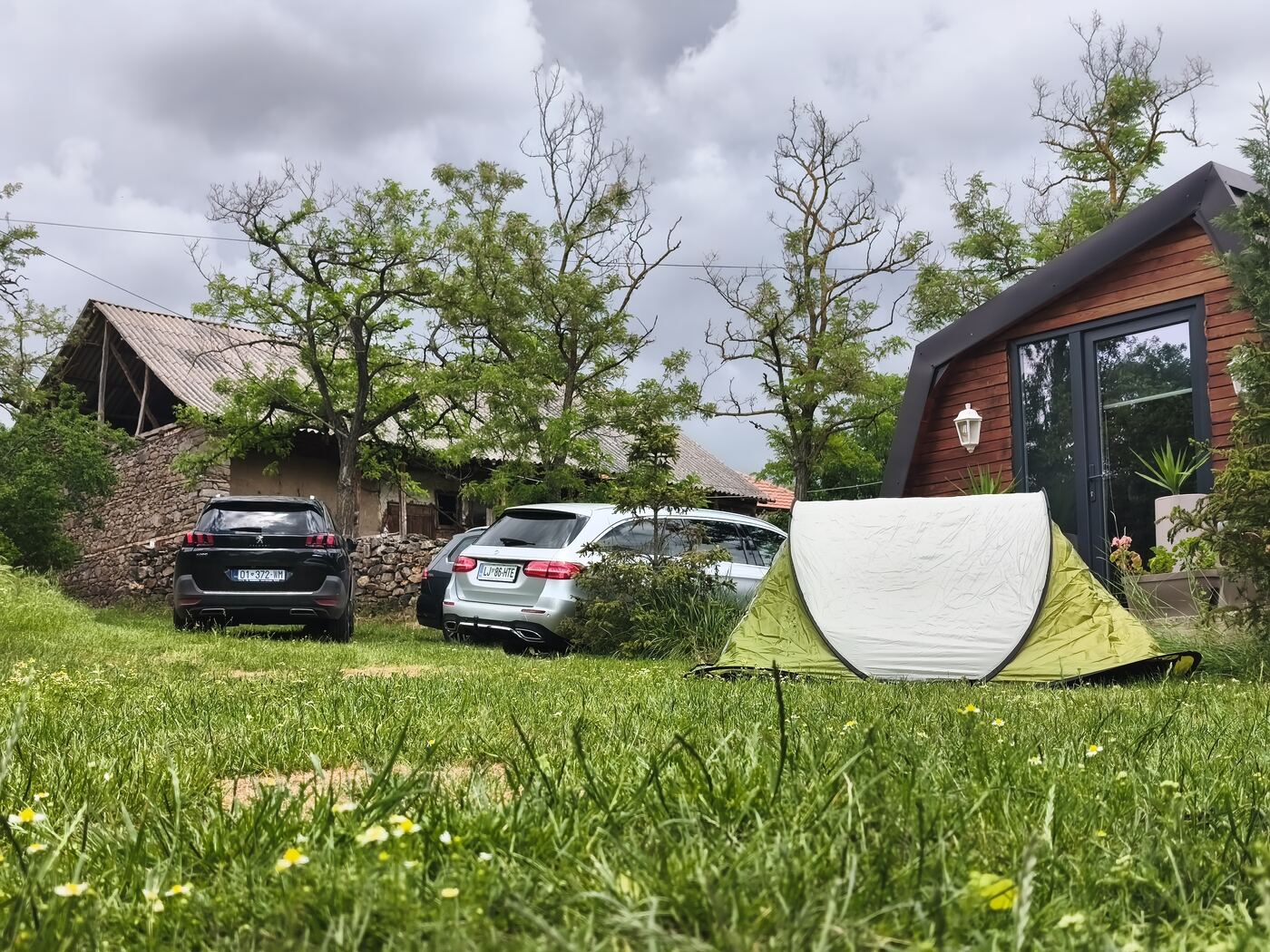 Camper vans and tent camping pitch at Teddy Camp, secure parking near Pristina Kosovo
